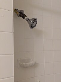 Shower dripped, and they have put a valve to "fix" it instead of repairing the issue in the wall.