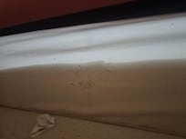 Under the mattress on top of the base.