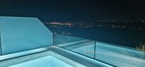 Pool & view at night.