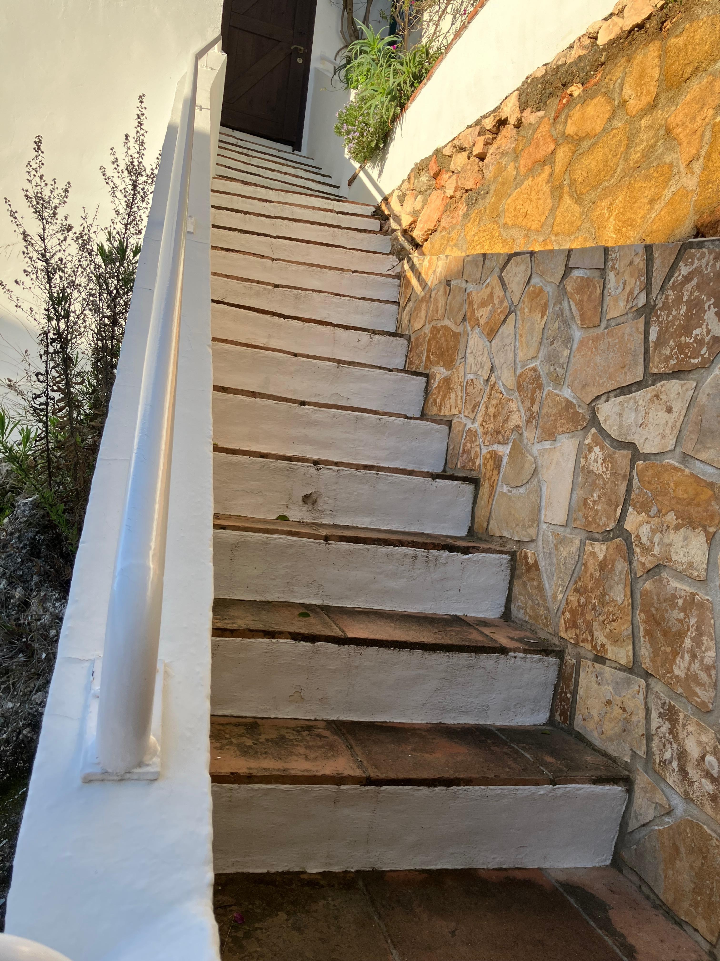 Steps from car park to villa