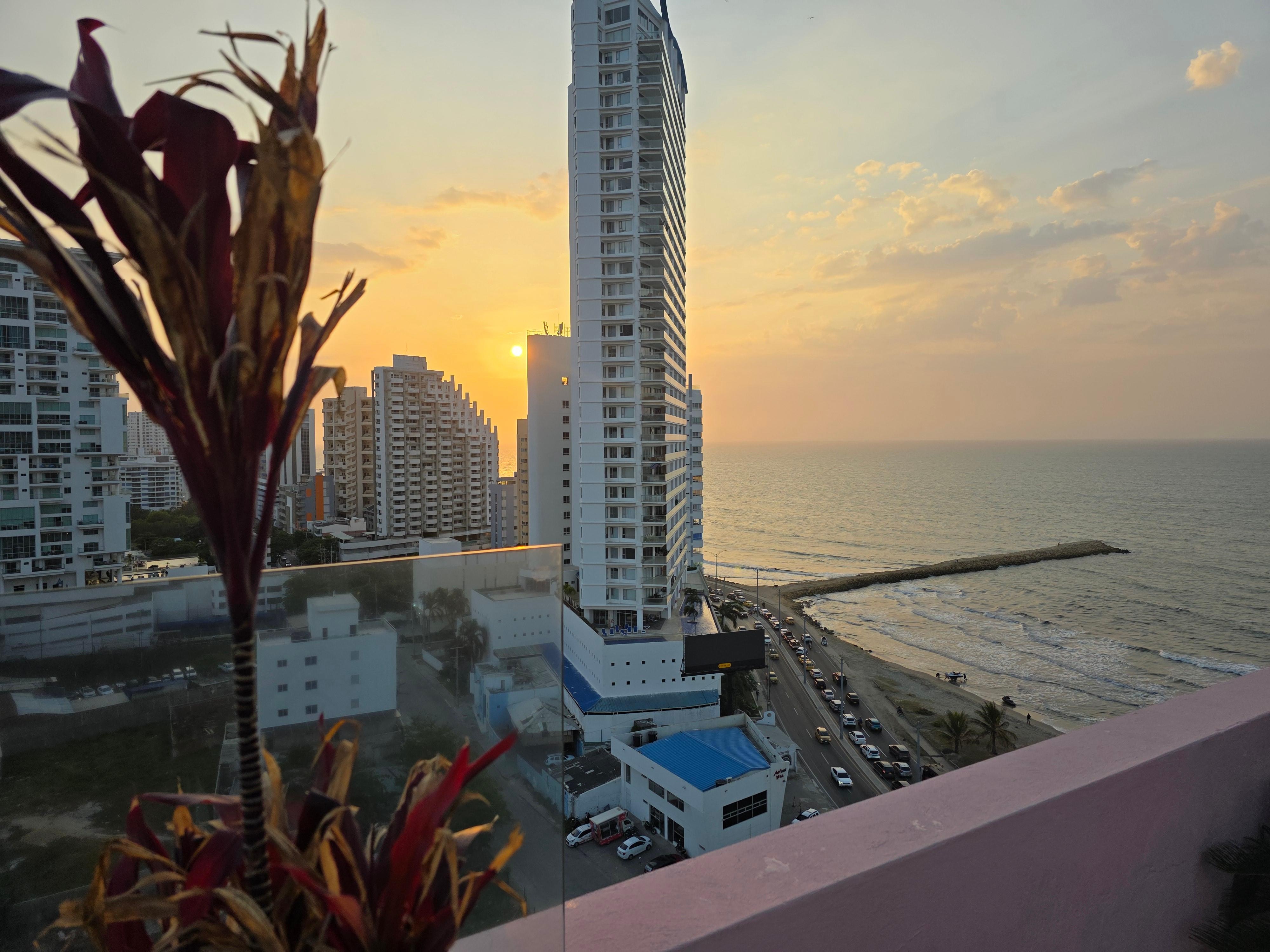 Beautiful sunset from pool area in rooftop. 