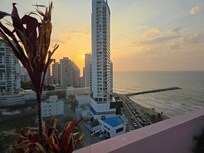 Beautiful sunset from pool area in rooftop.