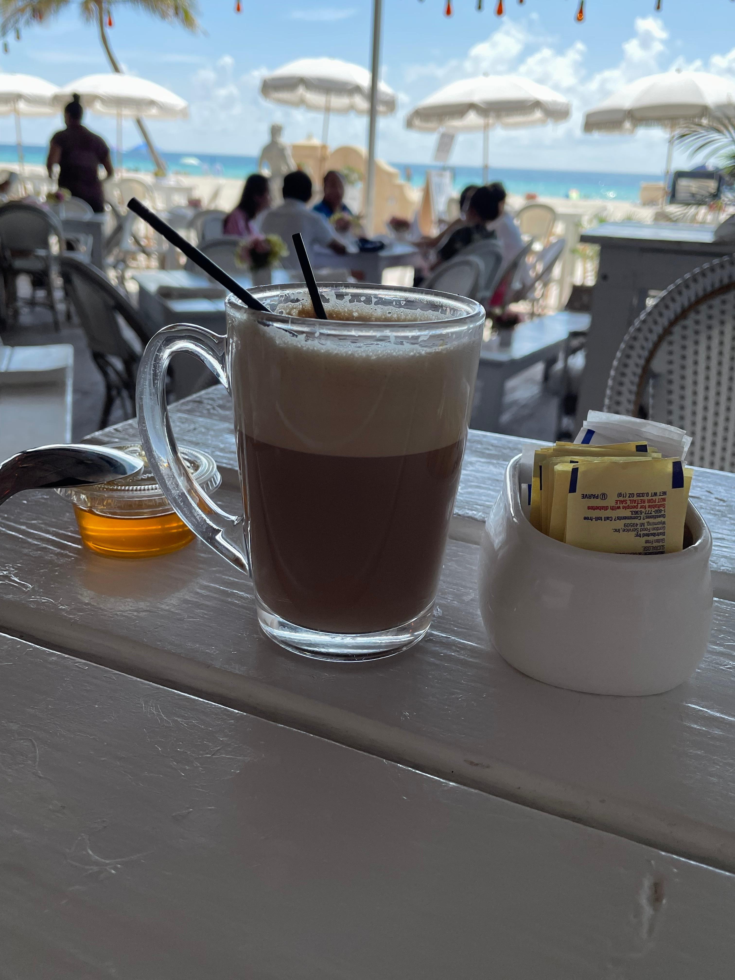 Latte and fruit bowl breakfast