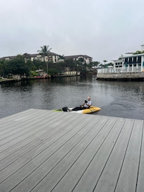 My husband kayaking