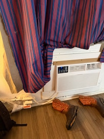 Holes in wall patched with masking tape, very noisy with drunken residents, police called 2 times while we were there