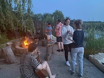 Singing by the firepit. Making smores.