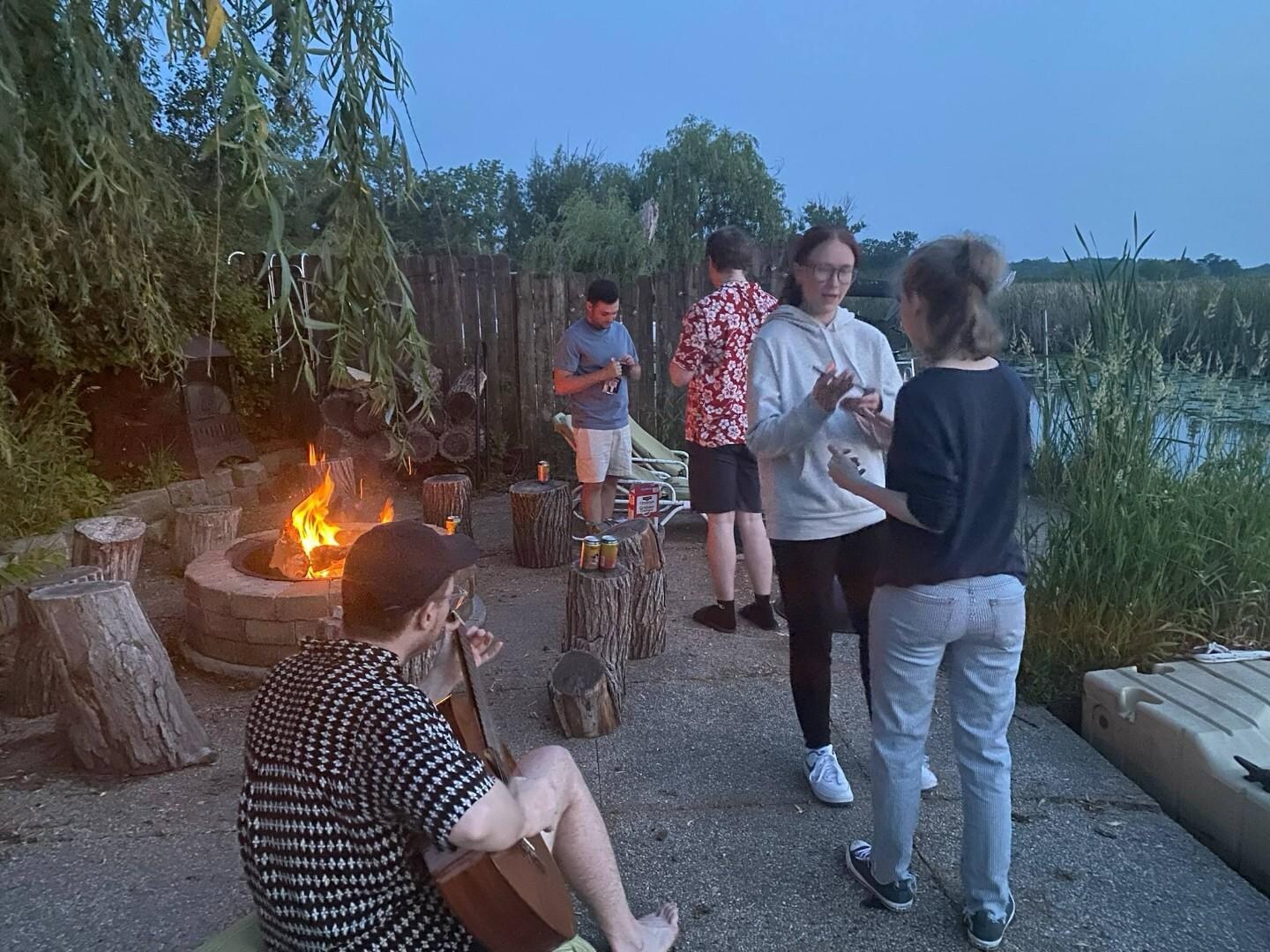Singing by the firepit. Making smores.
