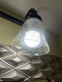 Master bath vanity light broken upon arrival.