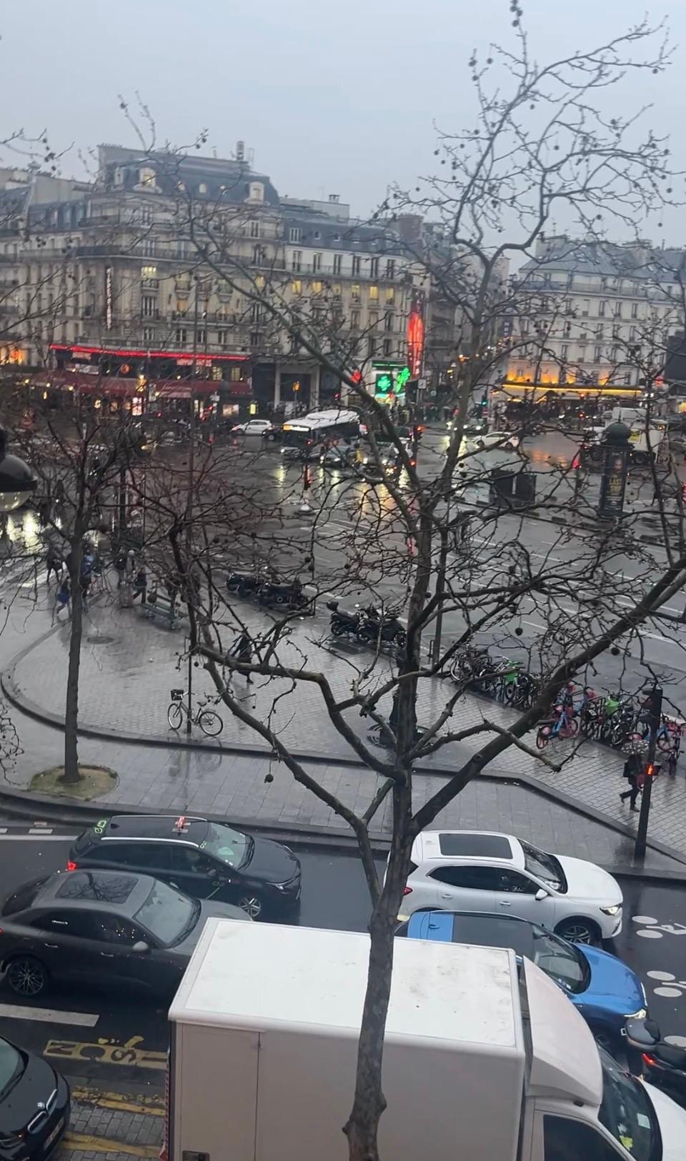 Window view, loved hearing the giant windows getting fresh air and hearing activity below but super quiet when you closed the windows. 