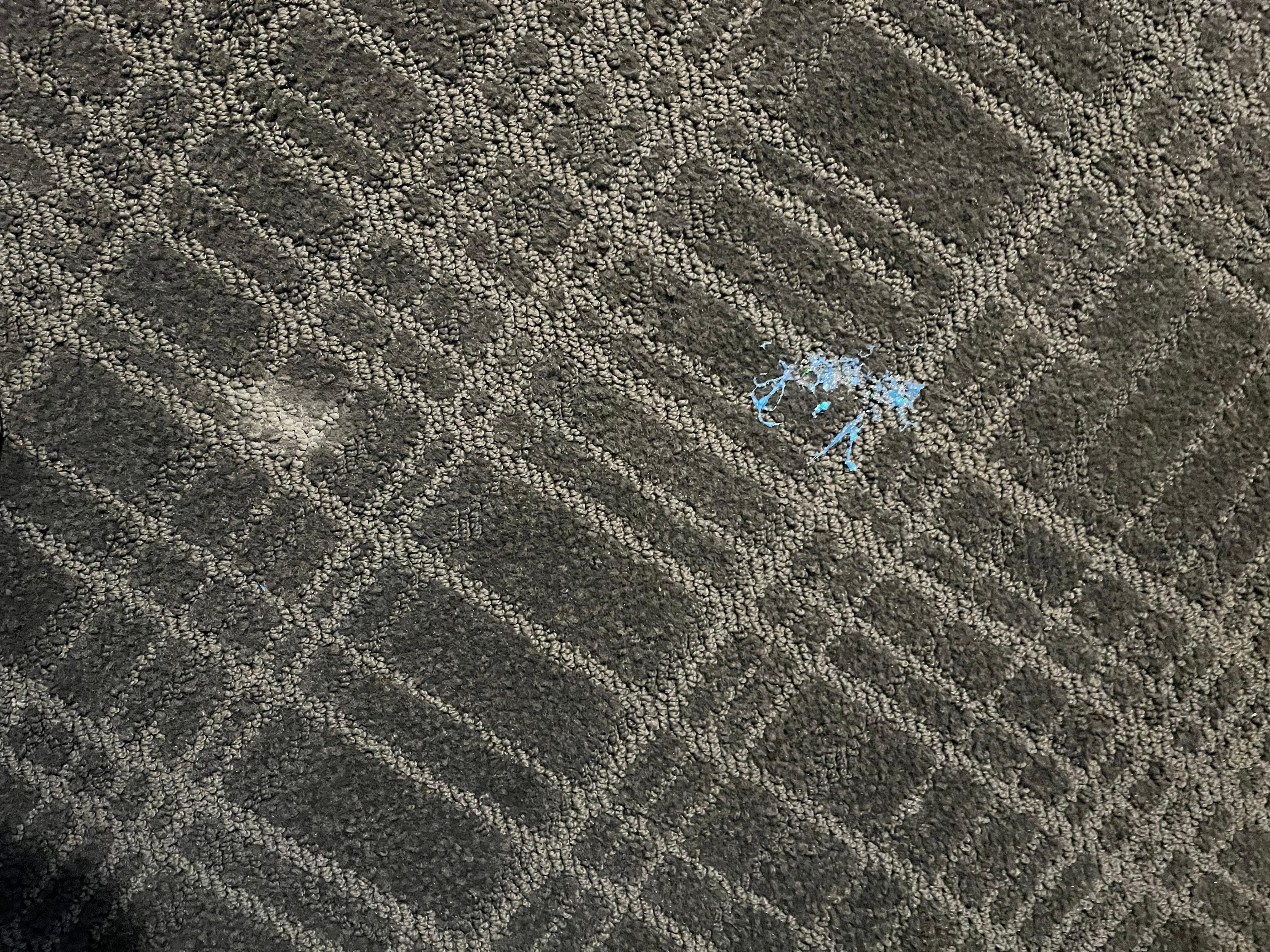 Sparkly glue on carpet