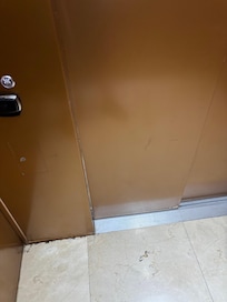 The elevator floor has cracks