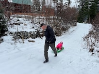 Sledding in the the driveway