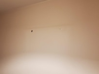 The (missing) picture decorating the room