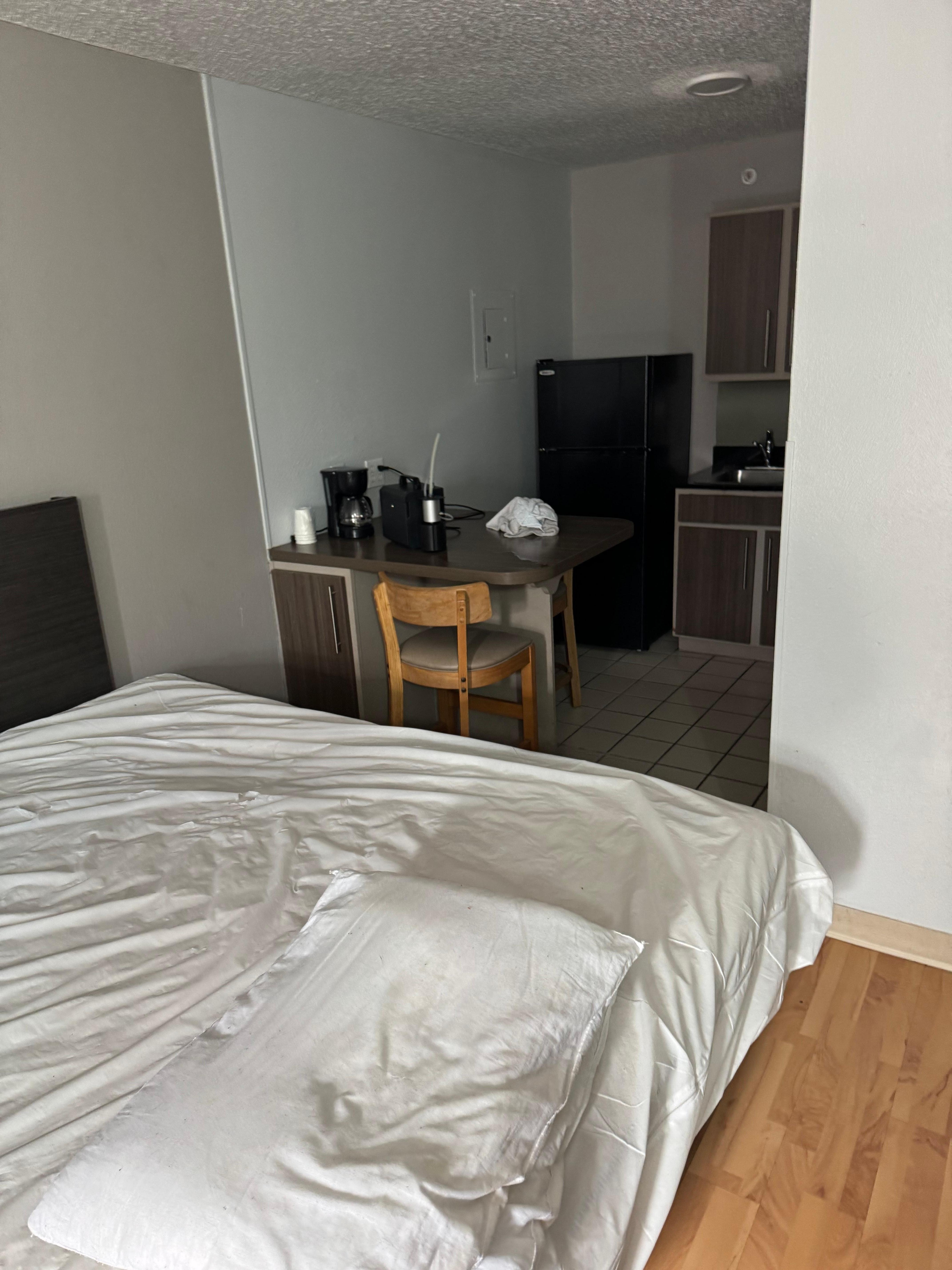 Coffee pot still on brewing. 