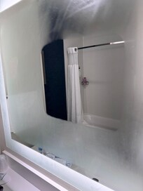 Fog free mirror in bathroom