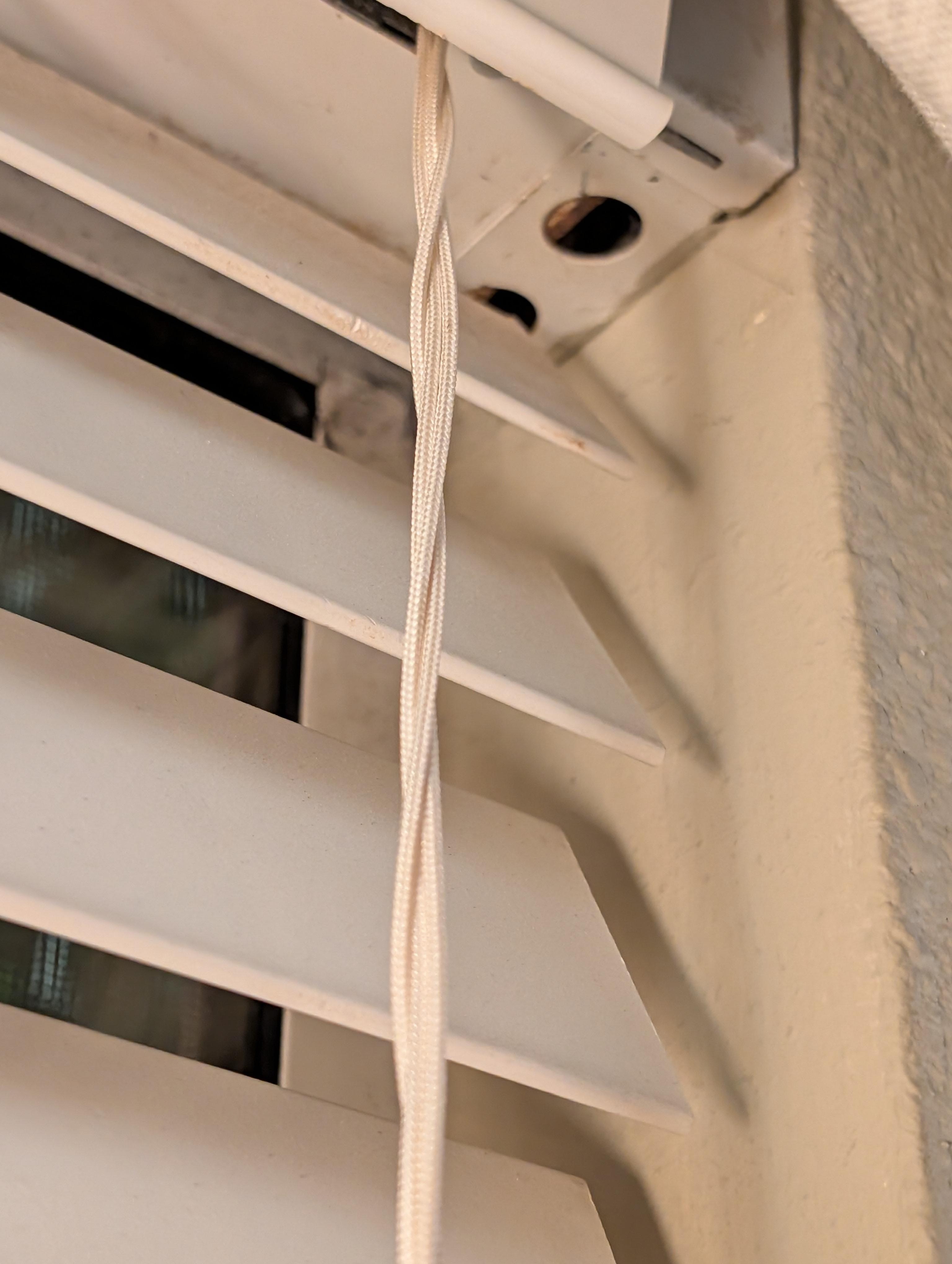 Both blinds missing wands to open slats 