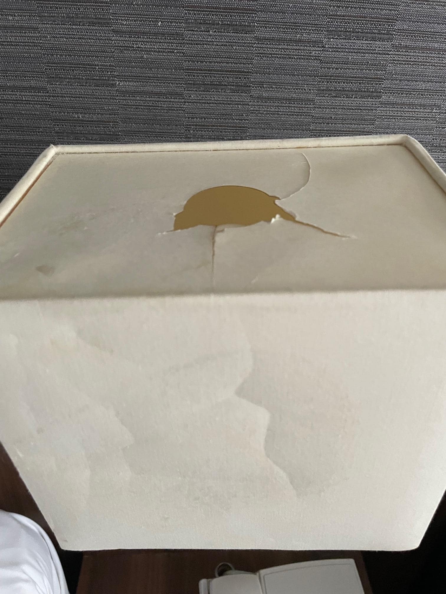 damaged bedside lampshade