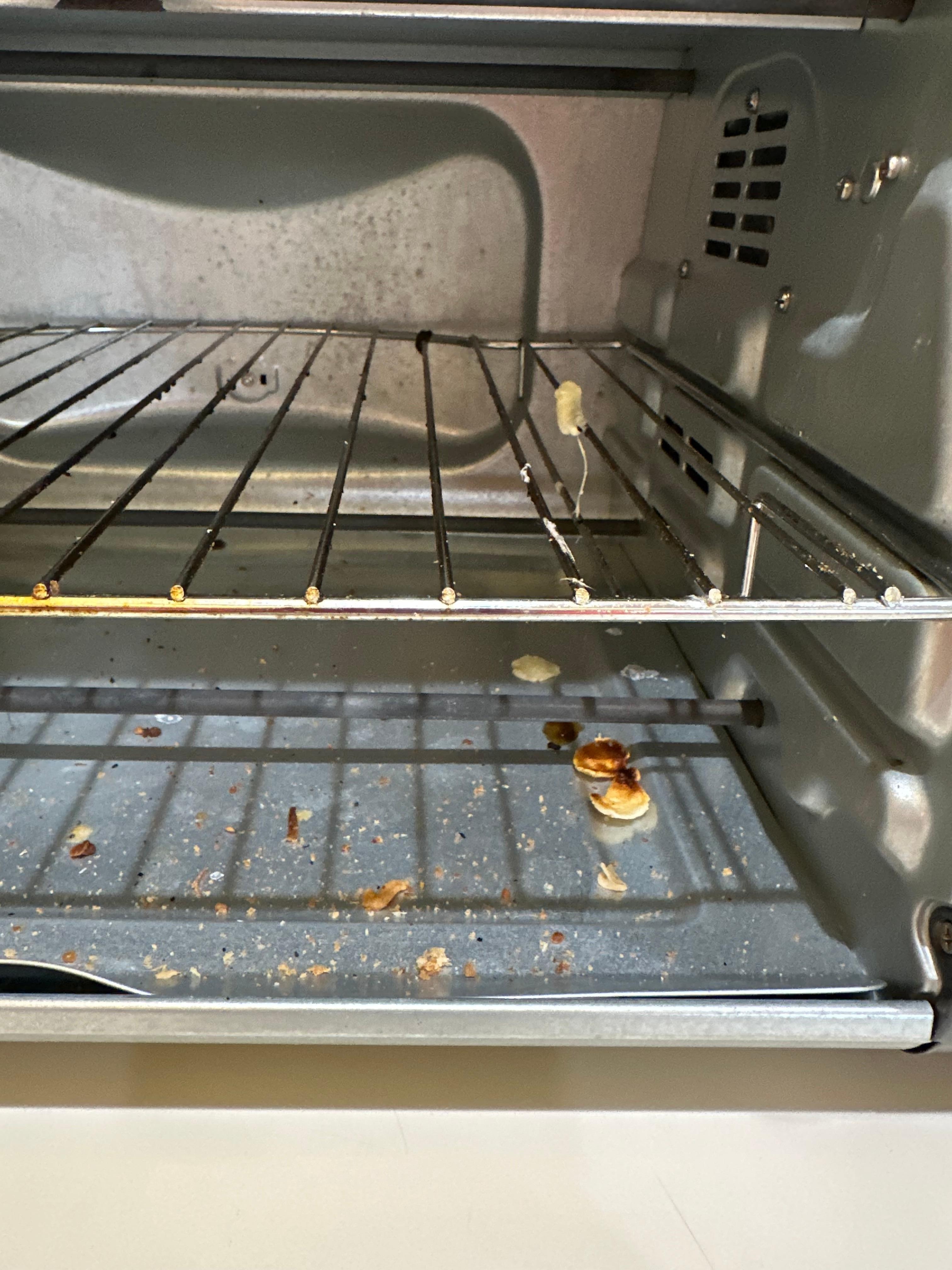 old food dripping from rack