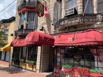 The front of the hotel with the lovely little chairs and tables for sitting, or waiting for a ride or having coffee or eating Amato’s pizza!