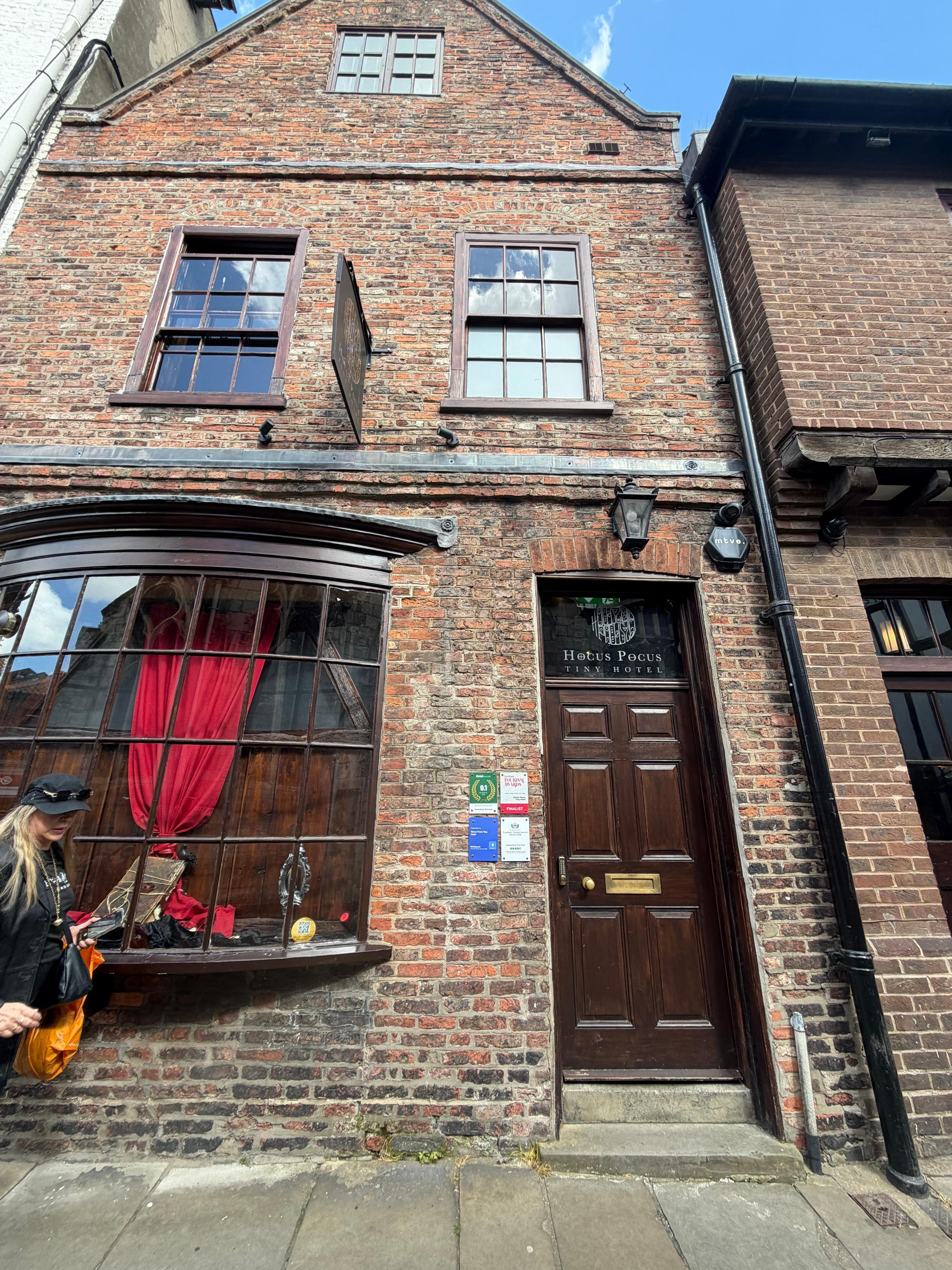 The outside entrance of Hocus Pocus Hotel