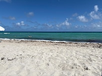 Beach by the property.