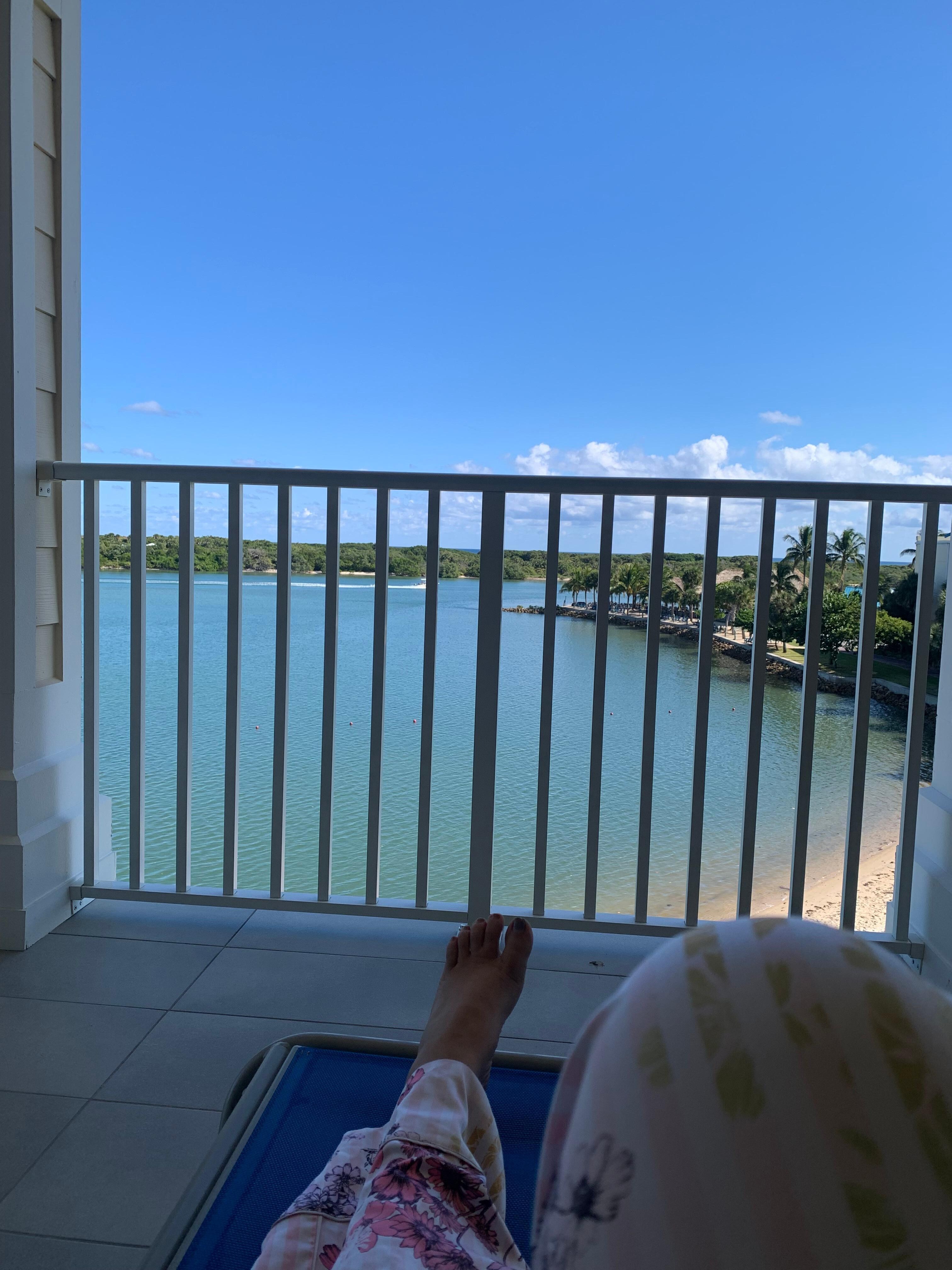 Relaxing and enjoying the marina view.