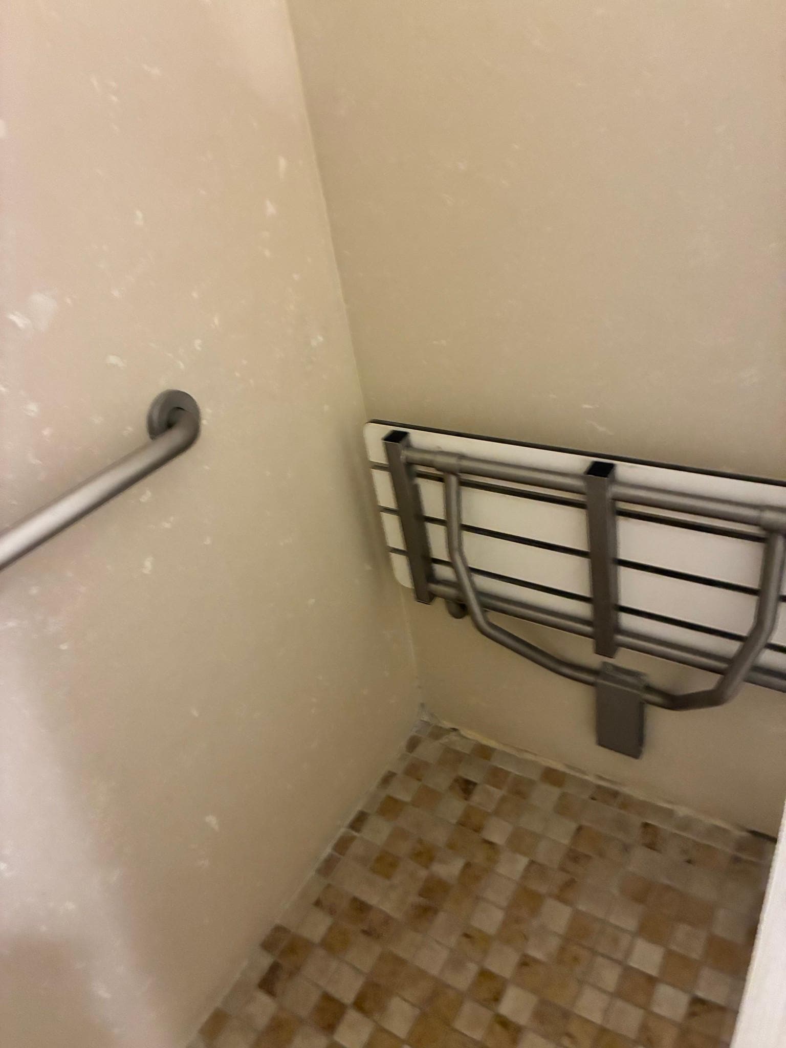 Seat in accessible bath