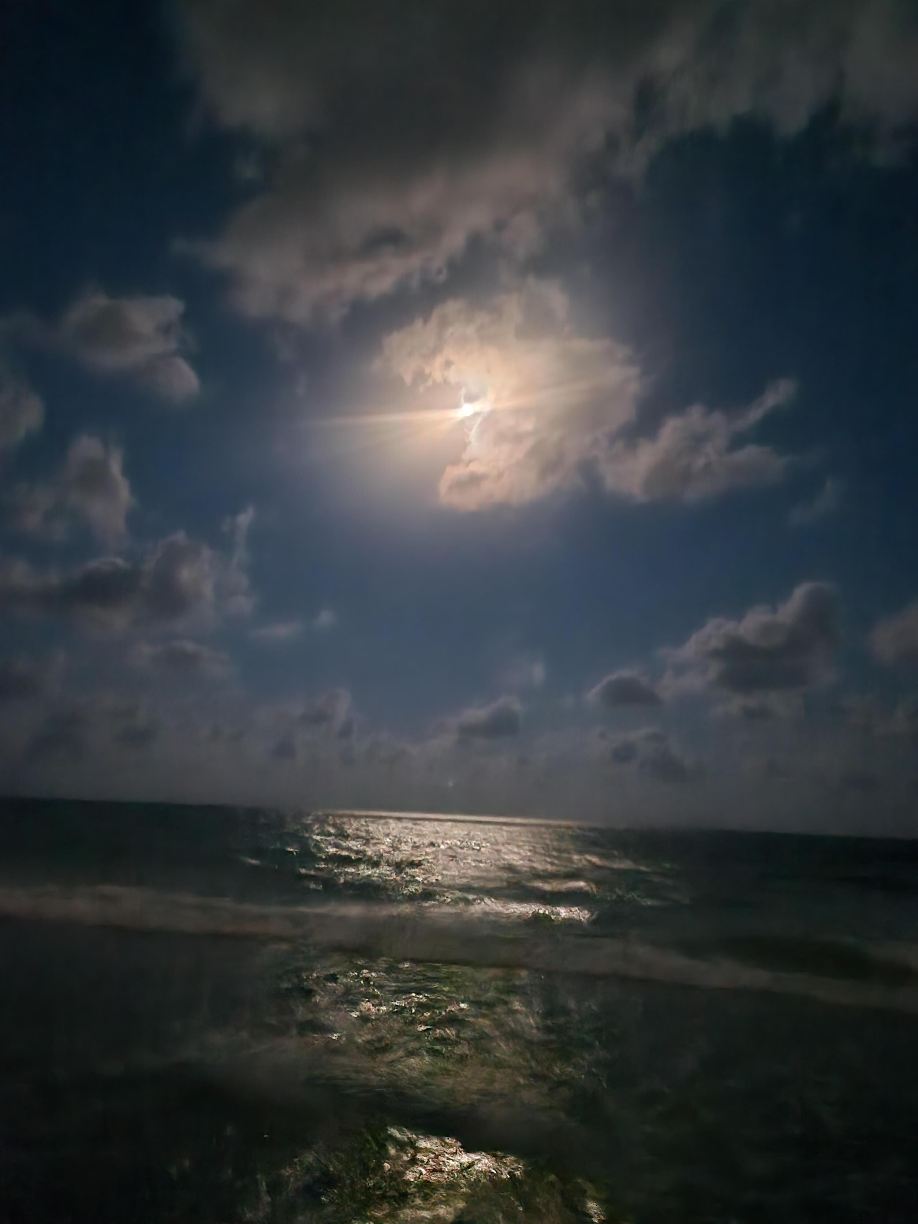 Moonlight view of the gulf  as we walked in the sand. 