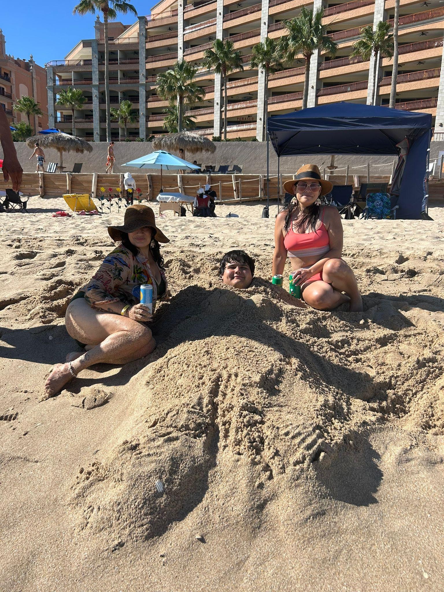 We had fun burying my nephew in the sand. 