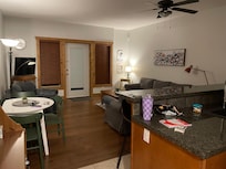 Kitchen living space with access to patio and pool
