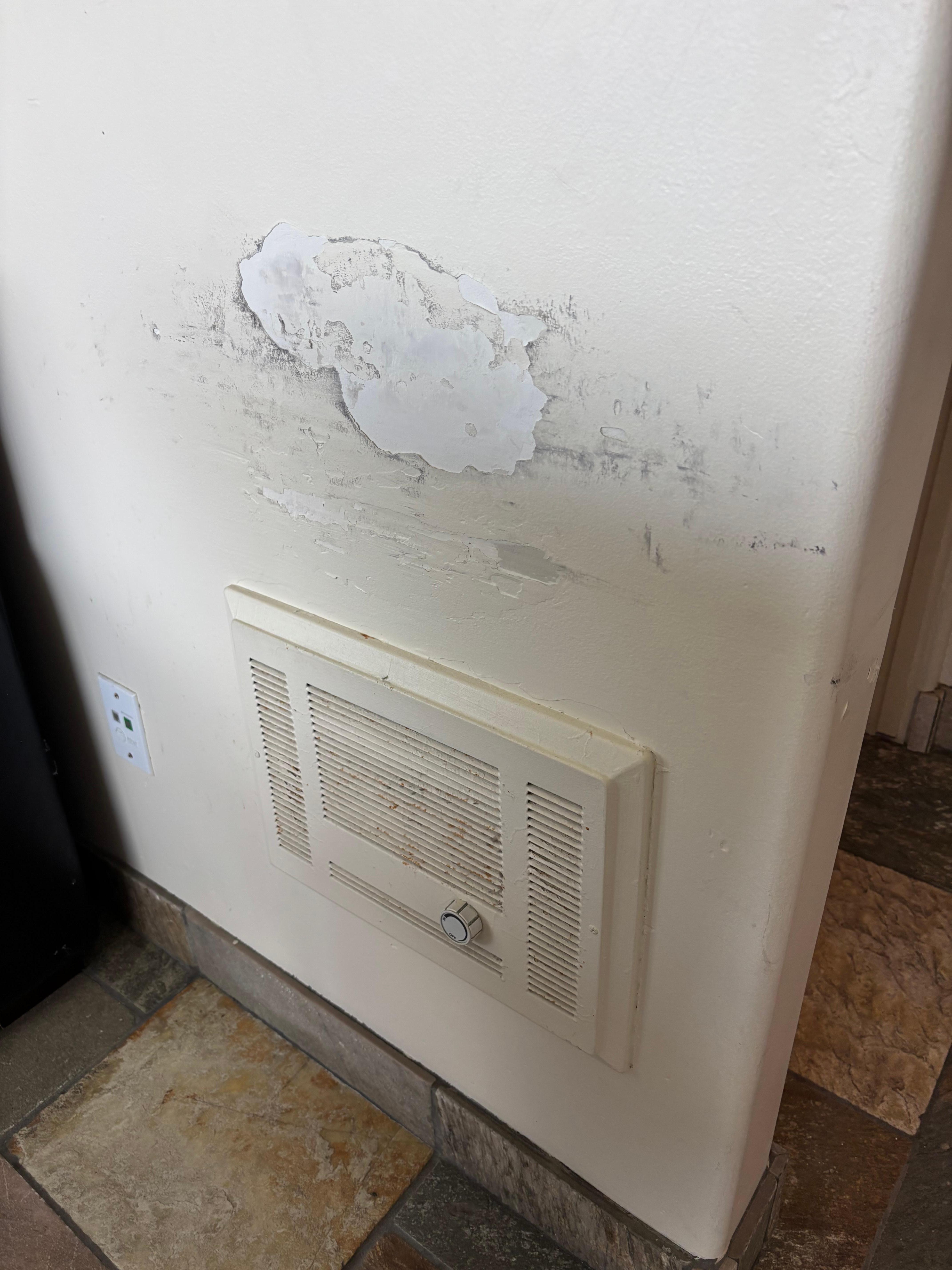 Rusty vents and gross walls. 