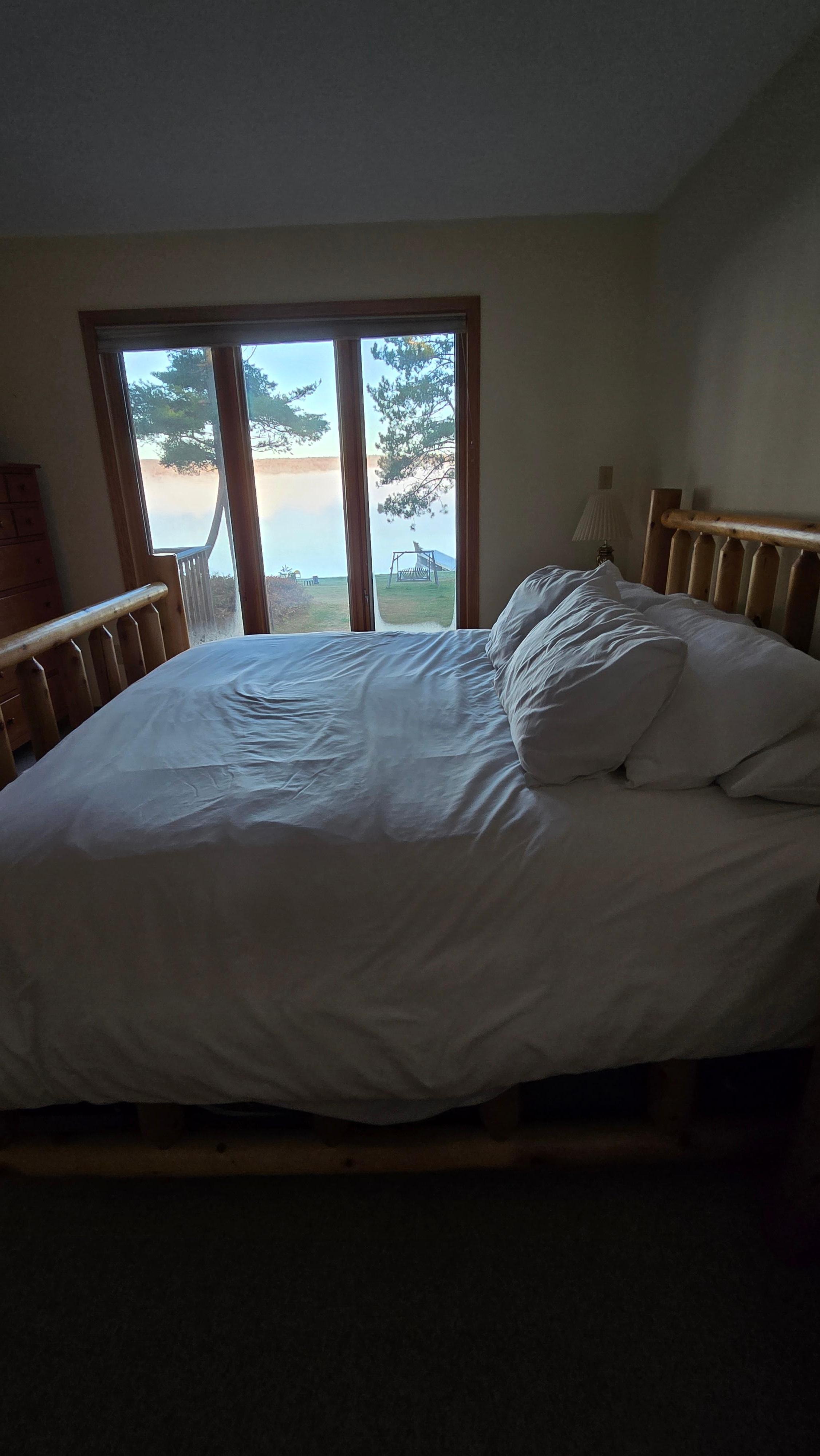 Master bedroom & the view of the lake.