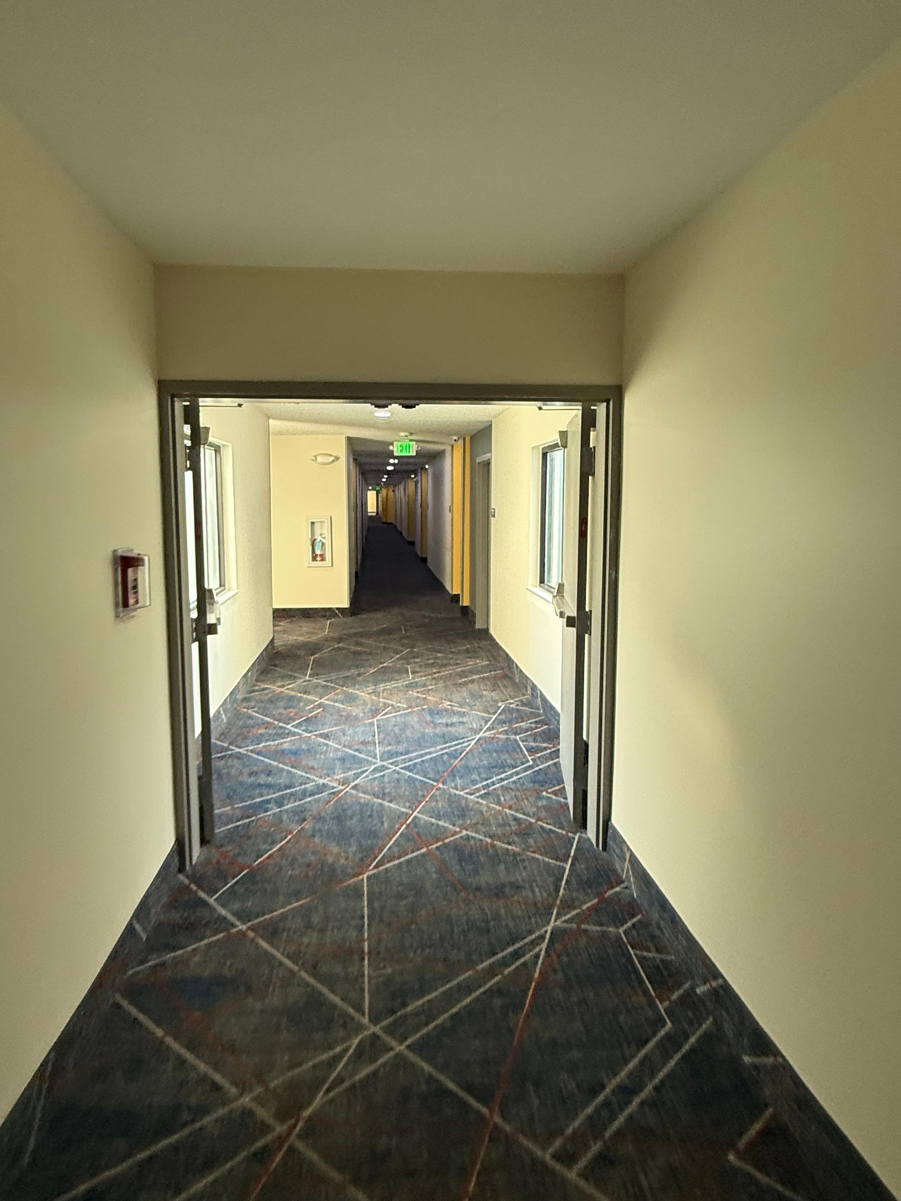 Hallways still have carpet and it’s easy to hear people through their doors. 