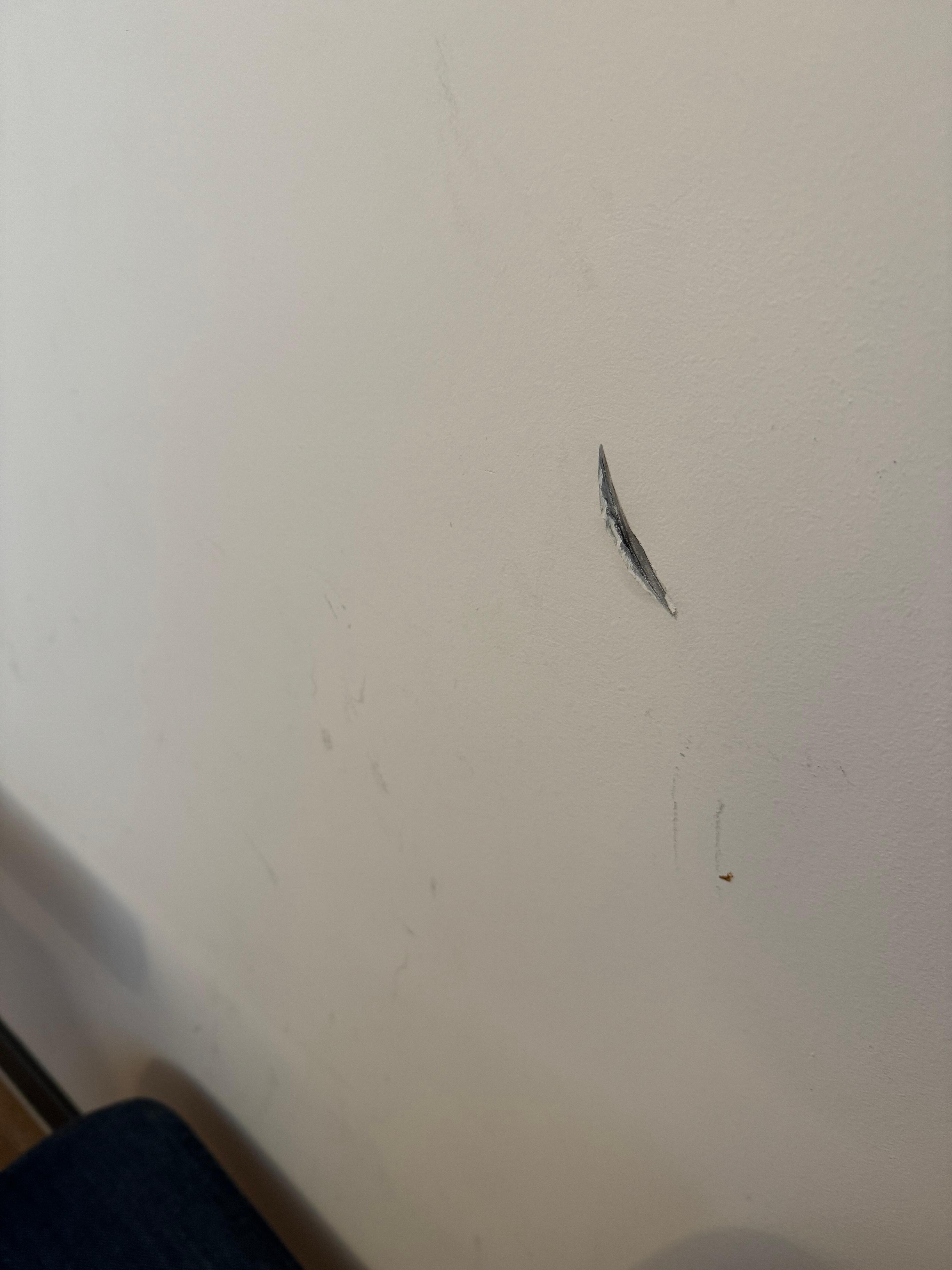 Gouge in wall