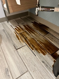 Toilet water leaking on floor