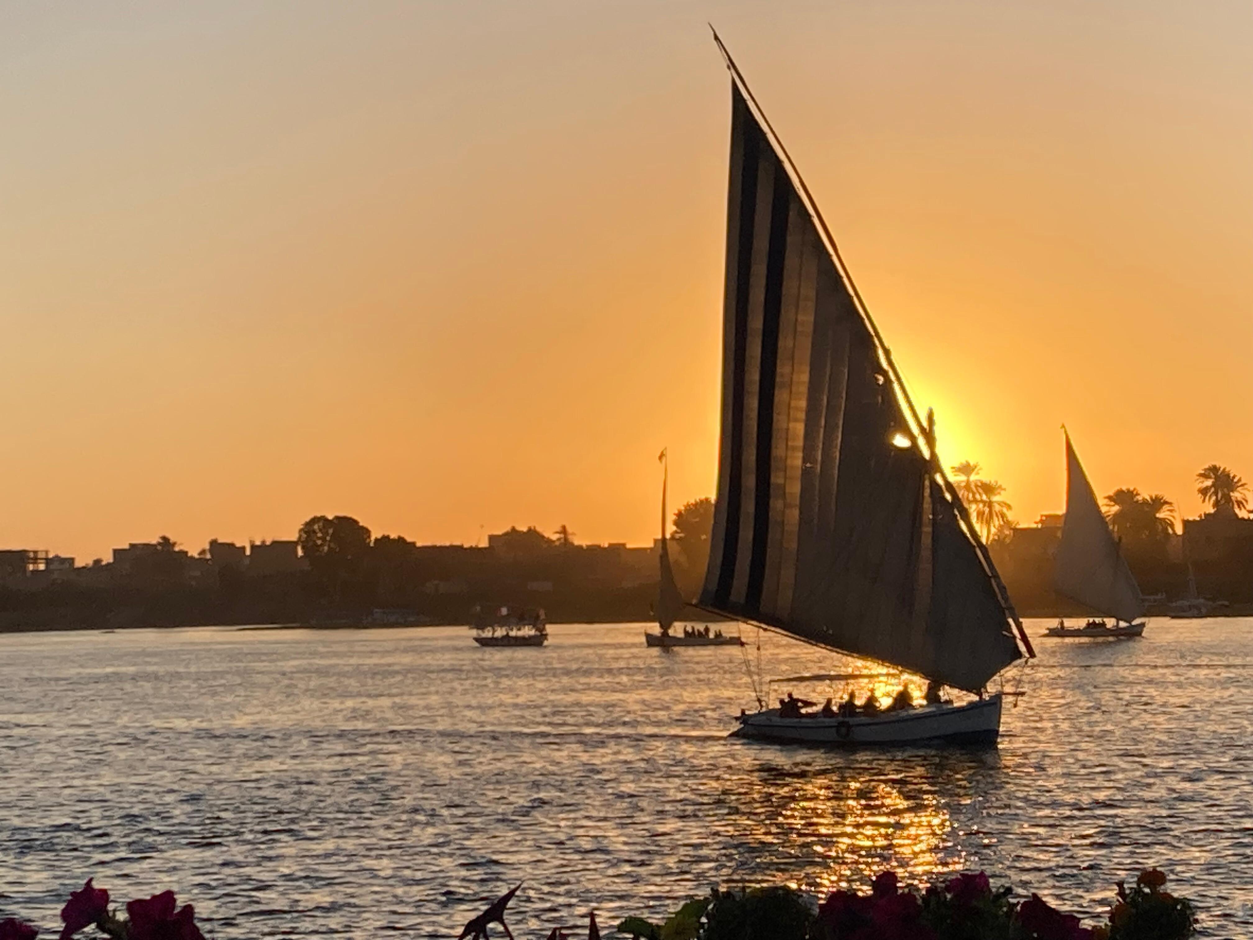 Falucca at sunset from patio.