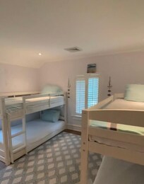 Upstairs bedroom with bunk beds