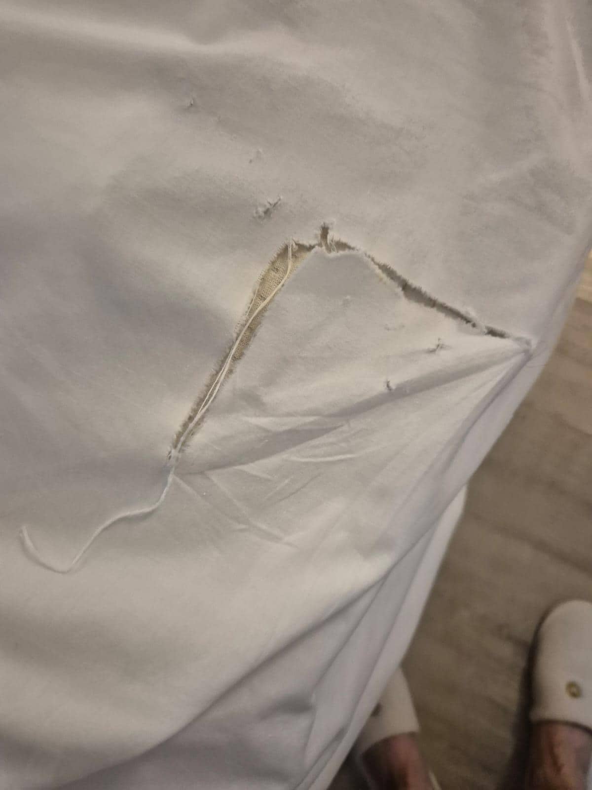 torn bedsheet