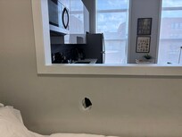 Hole in bedroom by the bed