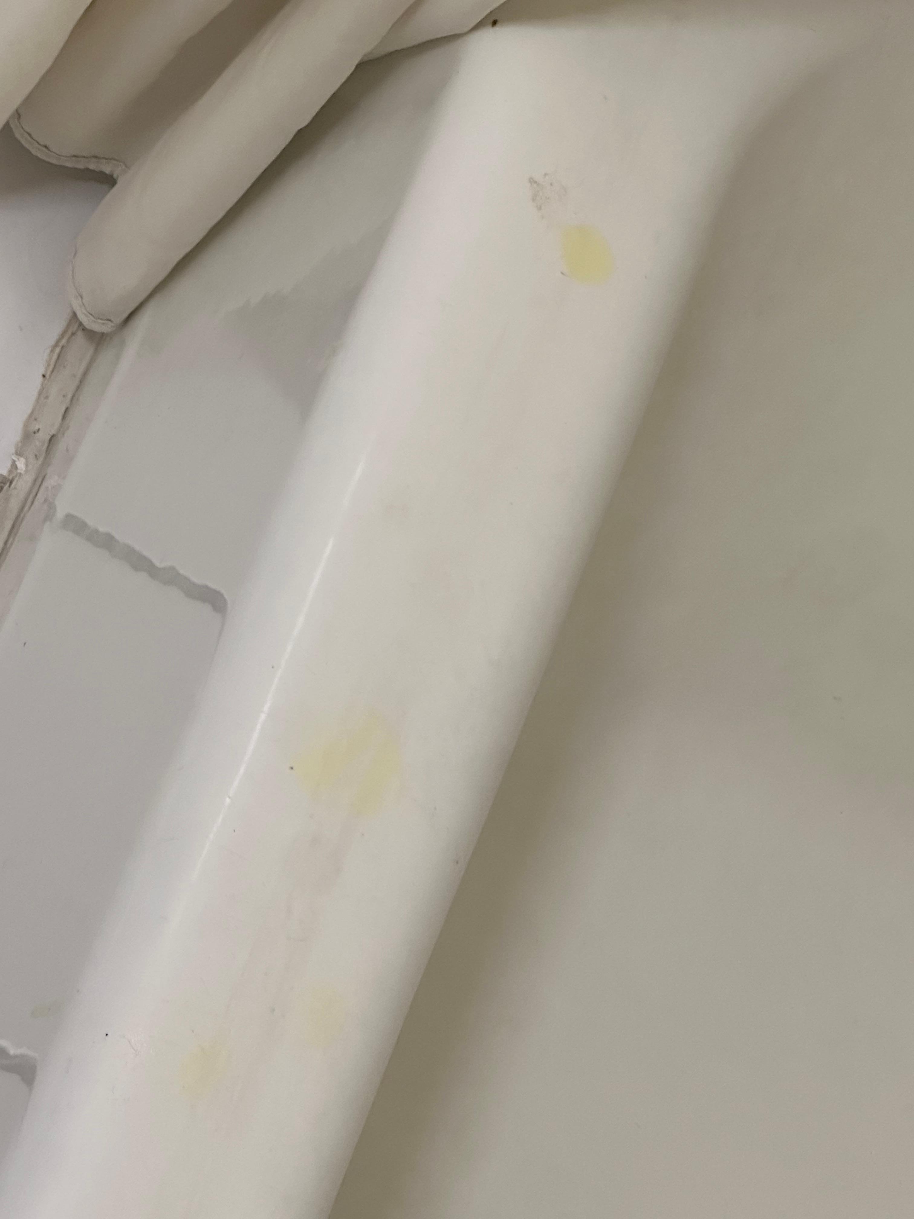 Leftover soap on the edge of the bath from the last guest