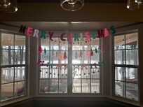 The decorations I added myself for our Christmas theme. But the home has a Christmas tree & other small Christmas touches!