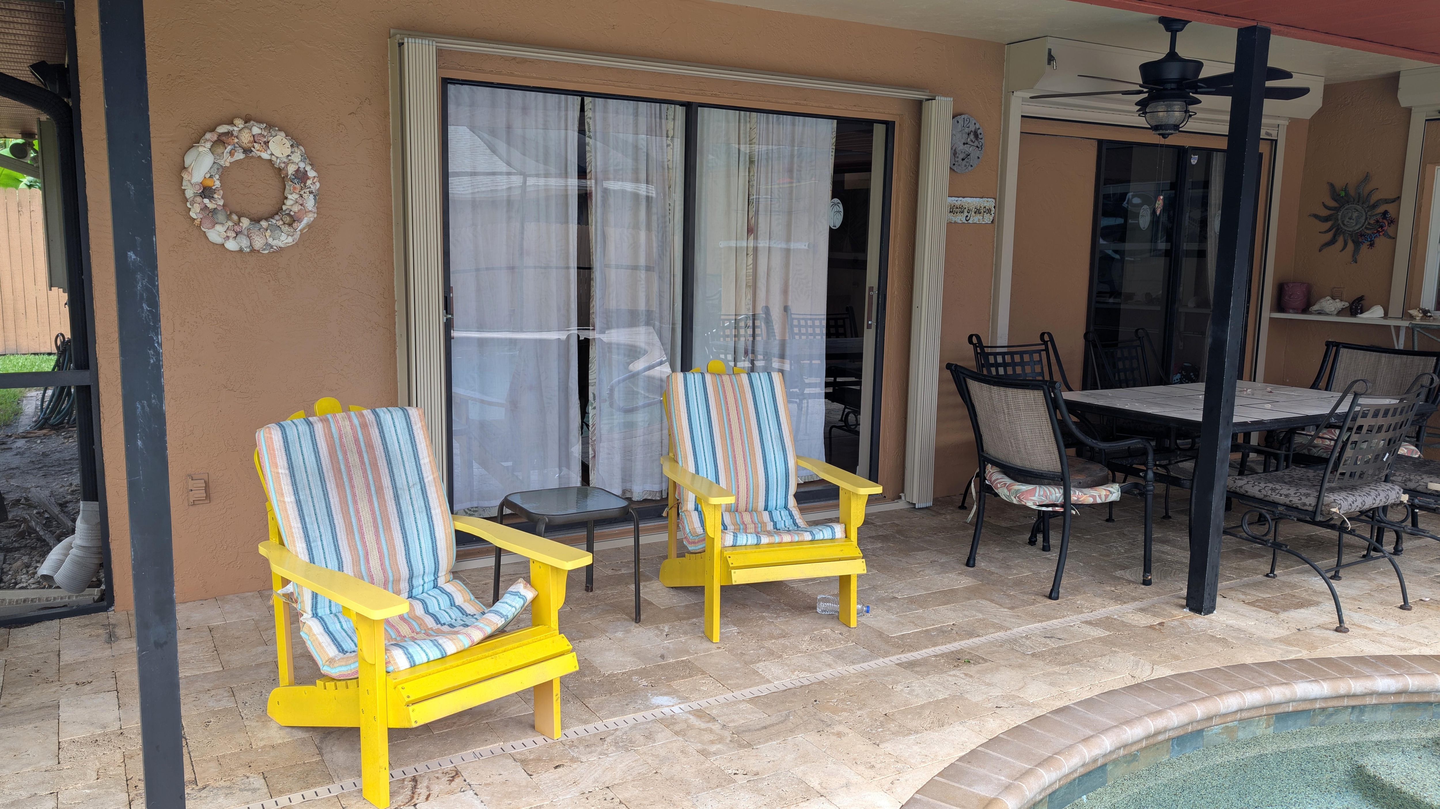 deck chairs and pool just outside the master bedroom. 