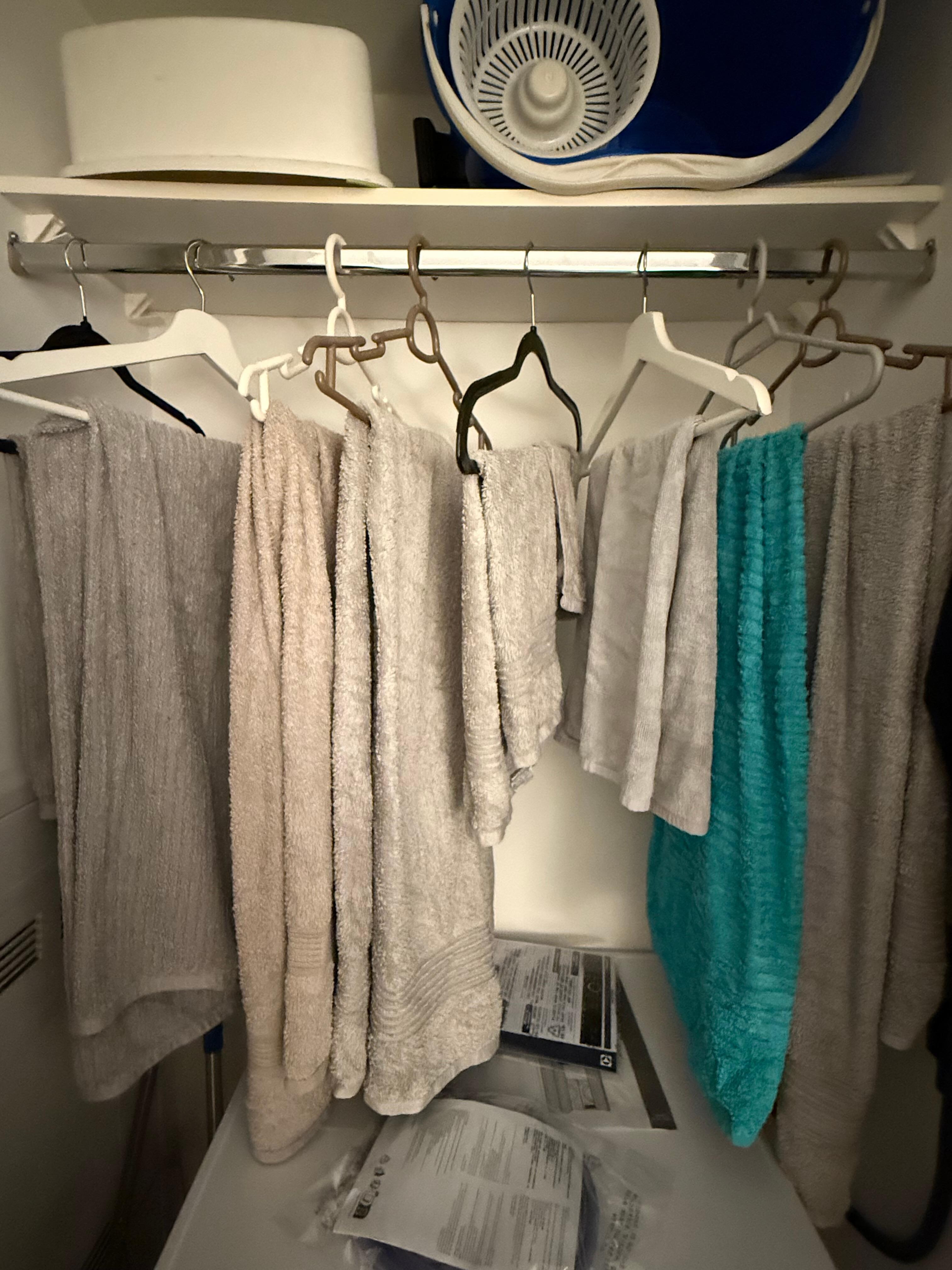 Damp towels and sheets taking all the hangers