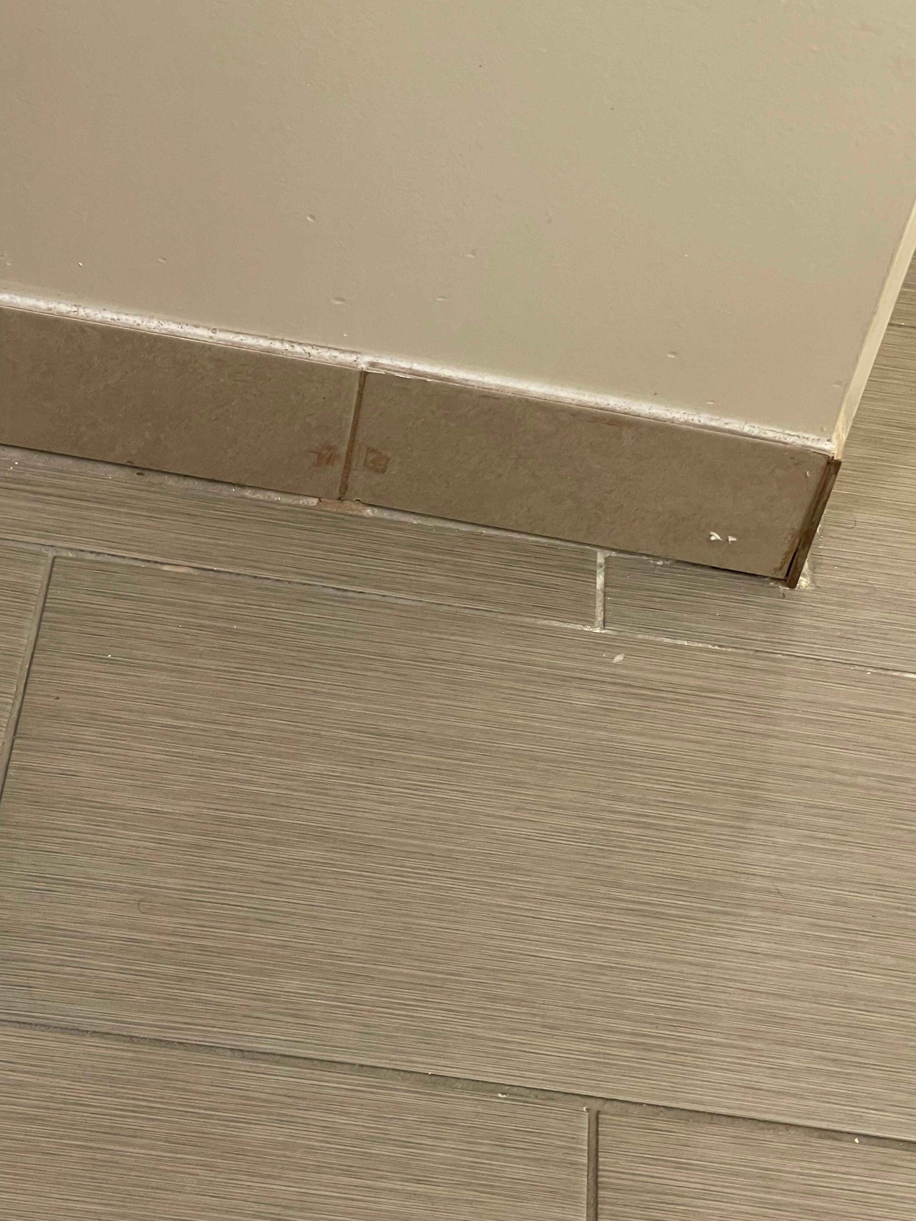 Stains on bathroom baseboards 
