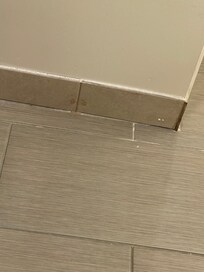Stains on bathroom baseboards