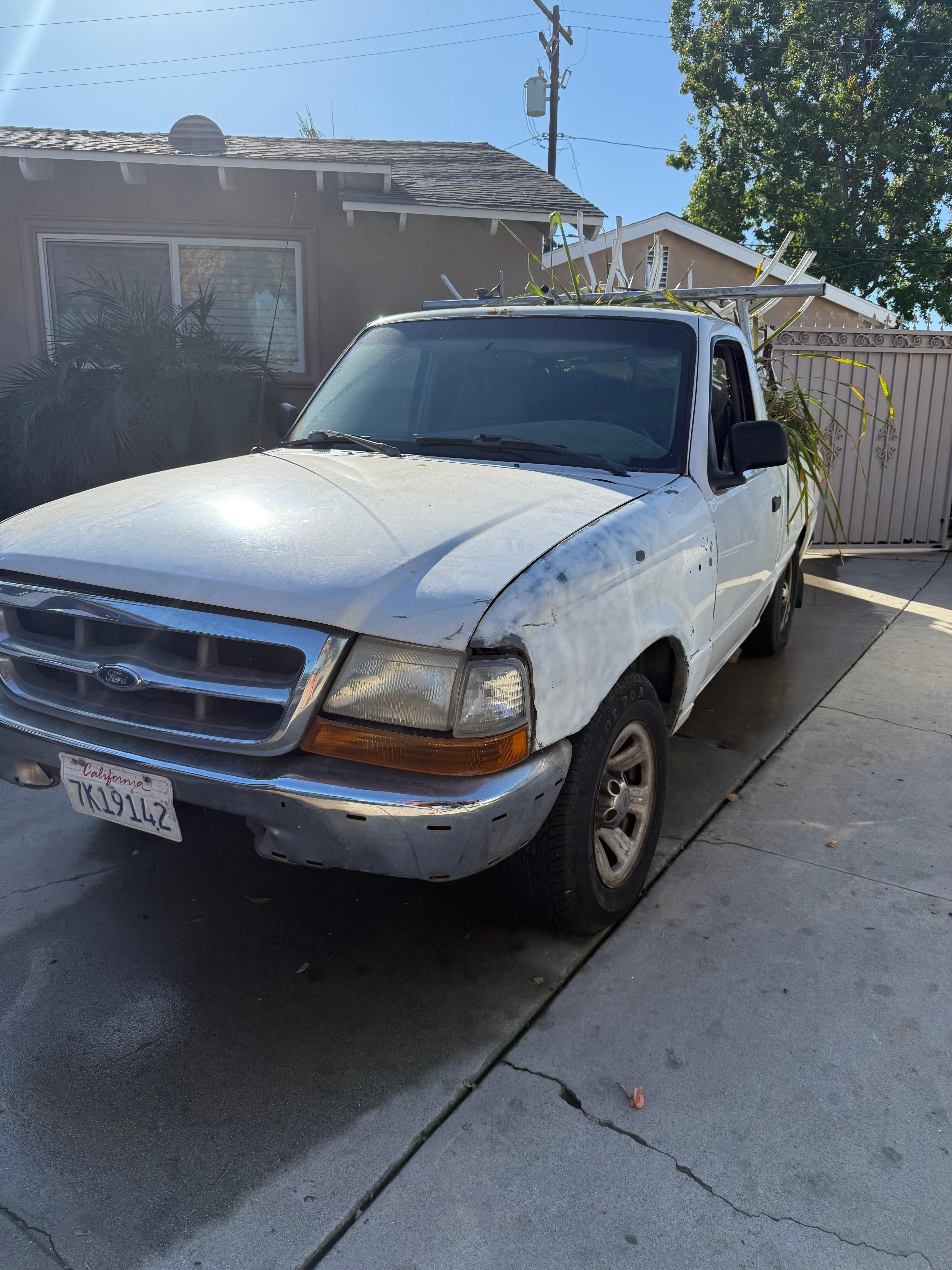 Construction workers car parked in driveway each day.