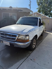 Construction workers car parked in driveway each day.
