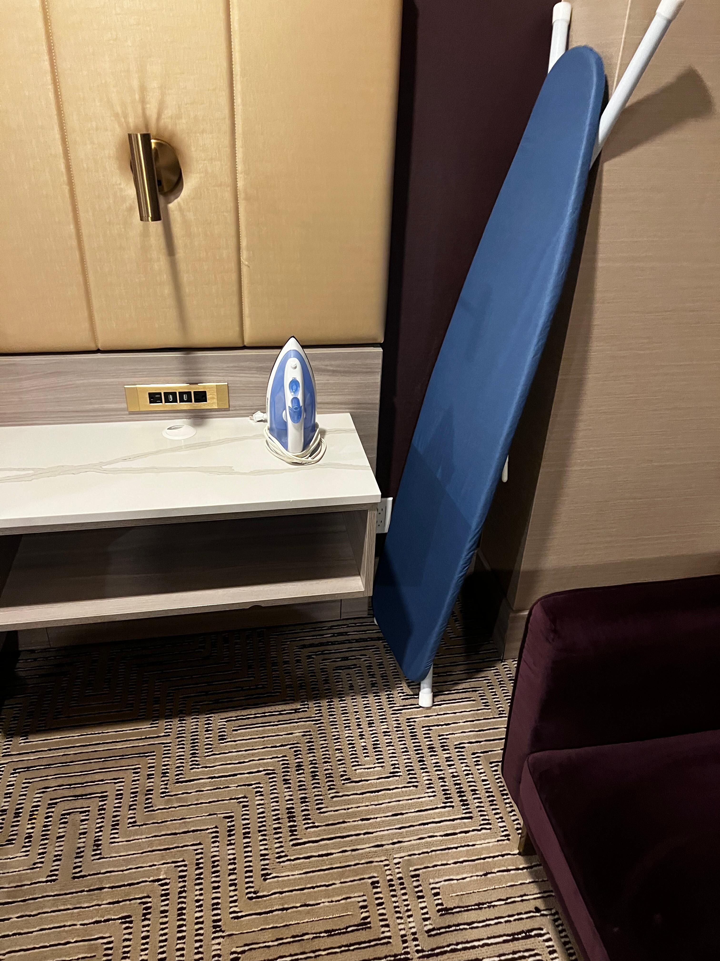 Iron and board beside my bedside table 