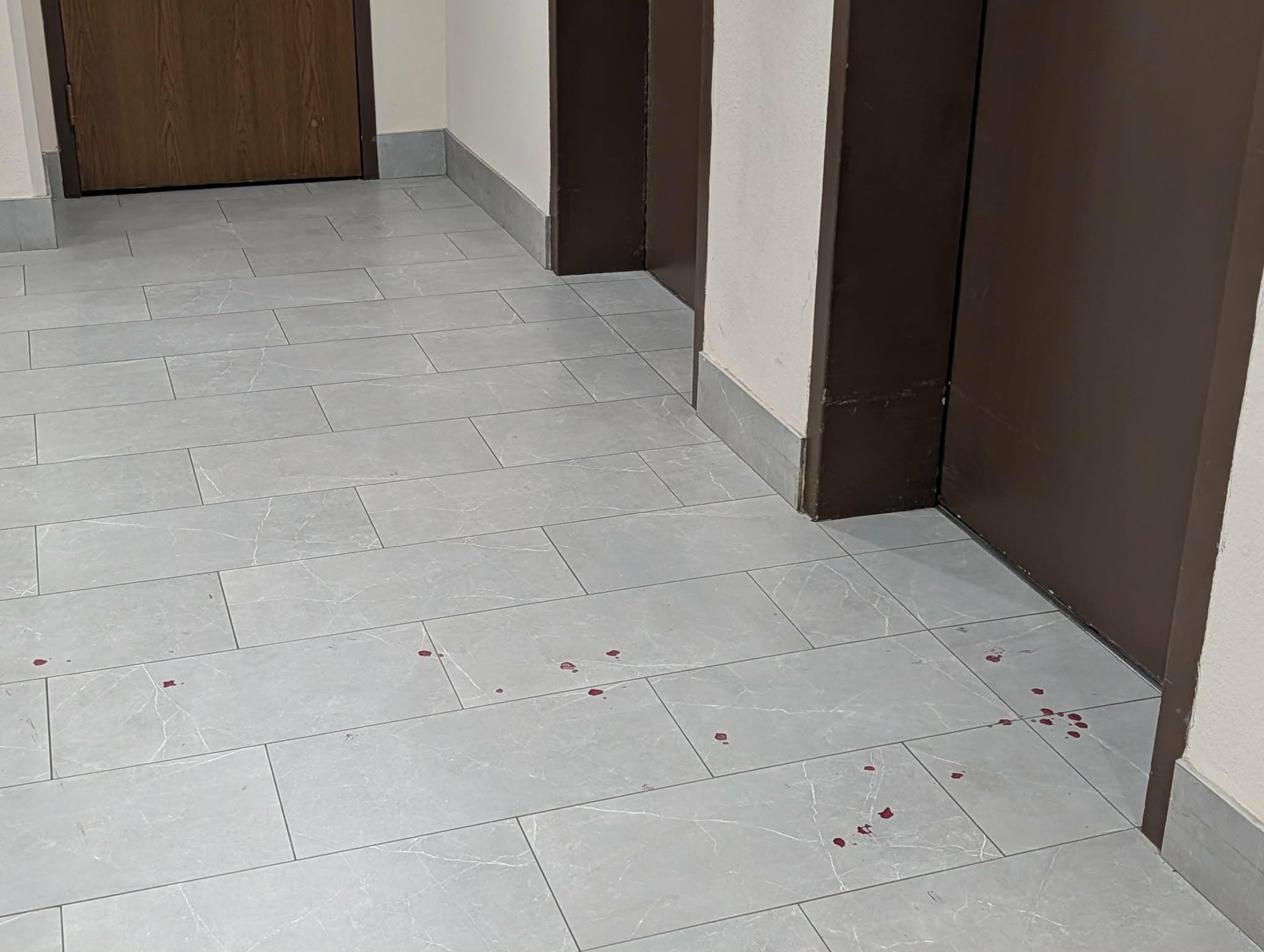 Before the elevator door on the 5th floor