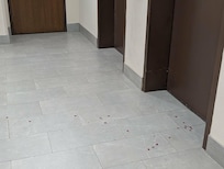 Before the elevator door on the 5th floor